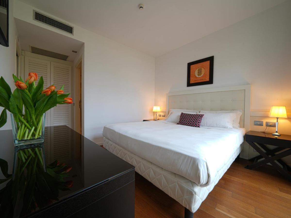 Pisa Tower Plaza 호텔 외부 사진 A bedroom at the hotel