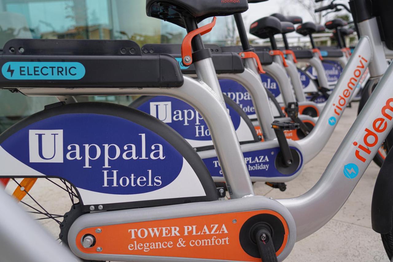 Pisa Tower Plaza 호텔 외부 사진 Electric bicycles at the airport